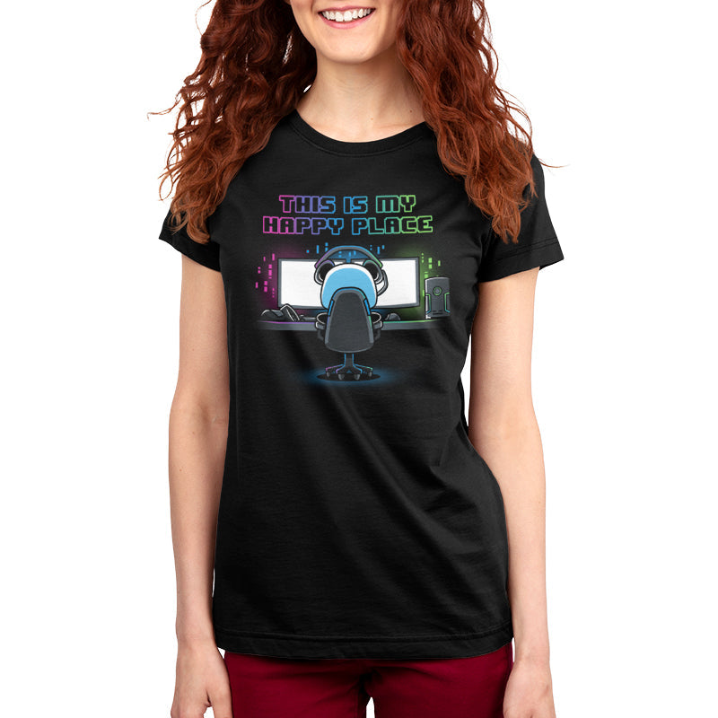 Premium Cotton T-shirt_Illustration of a person sitting at a computer desk with multiple monitors, wearing a headset and a black apparel. Above them, text reads "My Rig is My Happy Place" by monsterdigital in colorful neon letters.