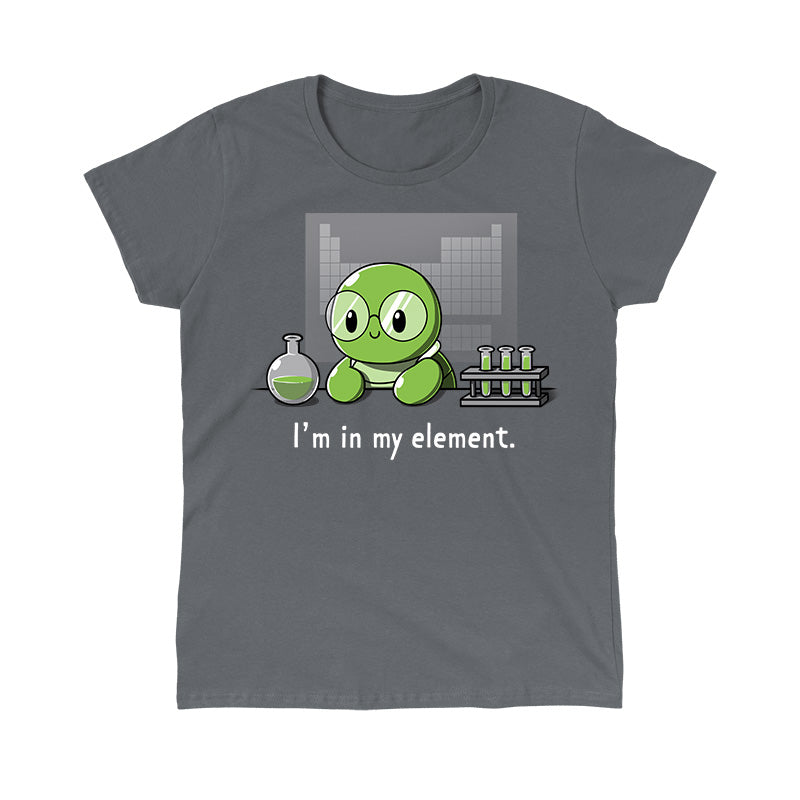 Classic Cotton T-shirt_A cartoon green turtle wearing glasses is in a lab with beakers and test tubes filled with green liquid. Text below reads, "I'm in my element." Wear this scene on an "I'm in My Element" apparel made from charcoal gray Super Soft Ringspun Cotton by monsterdigital.