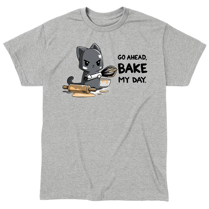Classic Cotton T-shirt_TeeTurtle Go Ahead Bake My Day Heather Gray t-shirt featuring An angry cartoon cat holding a whisk and covered in dough stands next to a messy rolling pin and bowl with the text "Go Ahead, Bake My Day"